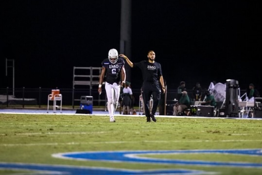 Cameron Winston coaching on the sideline